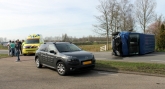 112-dokkum Bestelbusje op zijn kant bij verkeersongeval op Rijksstraatweg