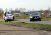 112-dokkum Bestelbusje op zijn kant bij verkeersongeval op Rijksstraatweg